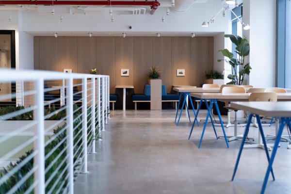 open workplace with tables and booths