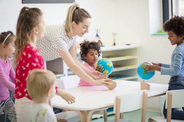 teach and children in private preschool