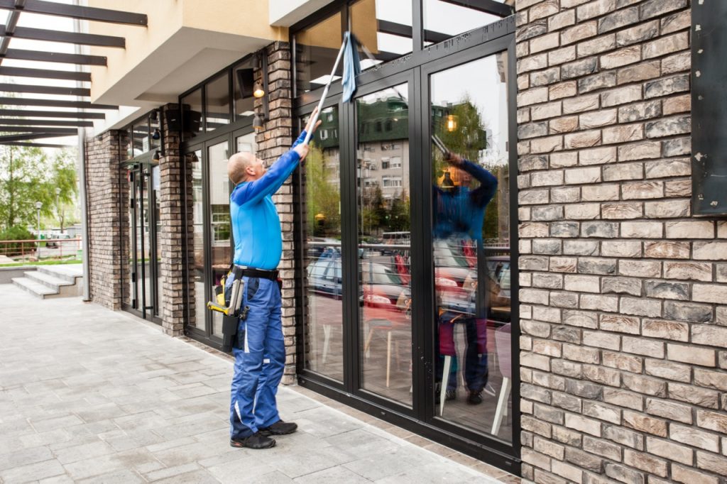 window cleaning professional outside of business